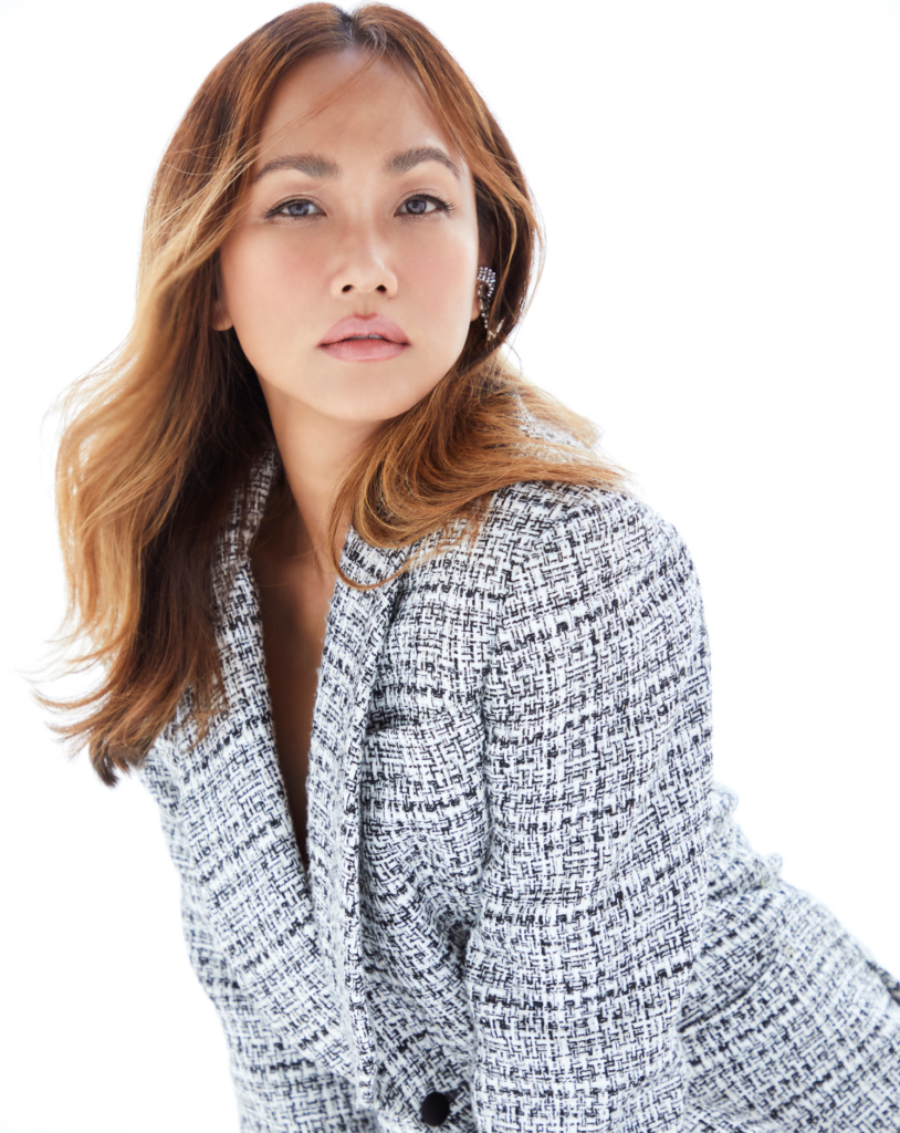 Thai woman in checkered suit