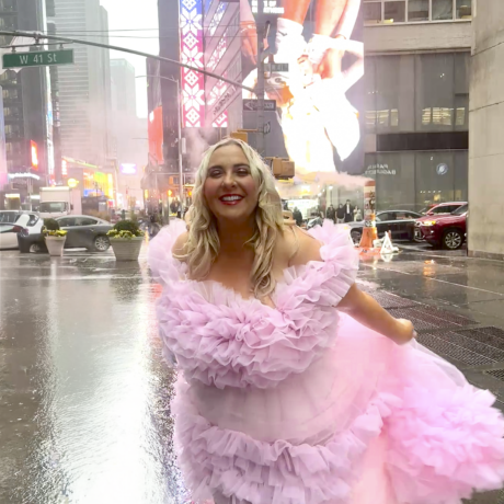 Julie NY Branding Photo in pink dress in the rain in Times Square